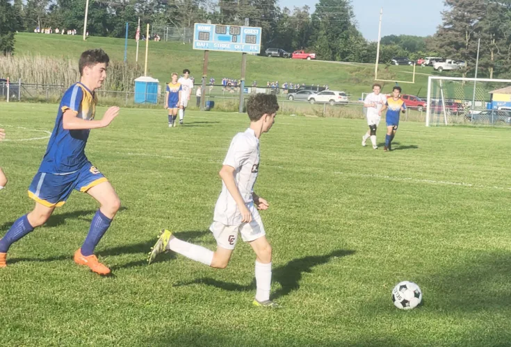 Catholic Central Keeps Pace Before Maroon Knights Pull Away